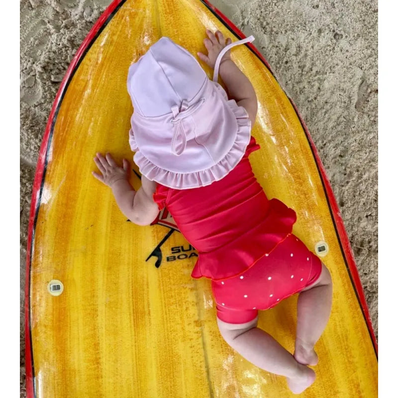 Rausva maudymosi kepurė nuo saulės UPF 50+ (0-2 m.)